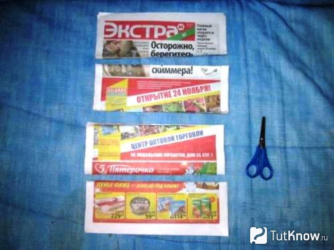 Нарезка газеты для изготовления бумажных полосок