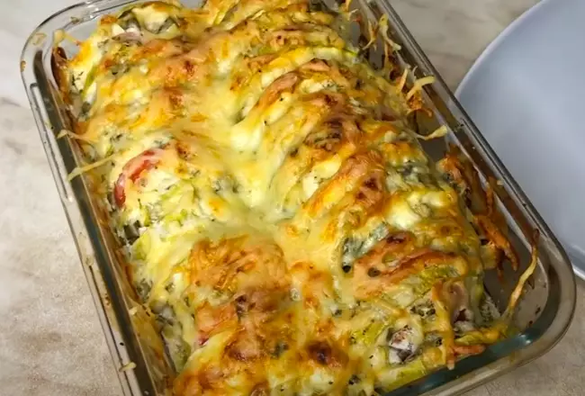 Кабачки с помидорами и сыром в духовке