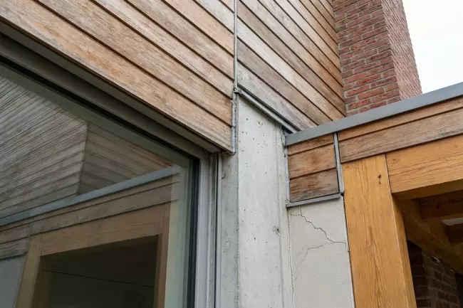 Деформационные швы и зазоры при усадке дома